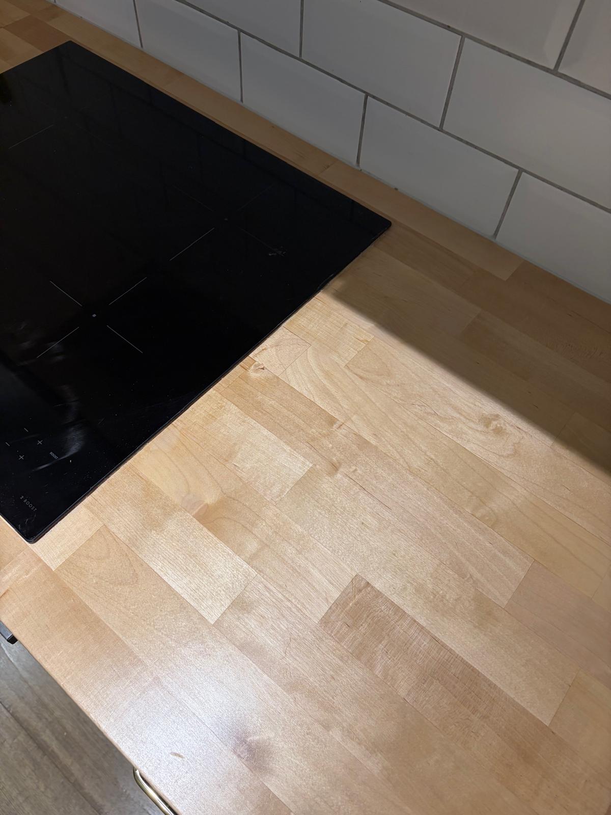 Wooden worktop scorch marks — after repair
