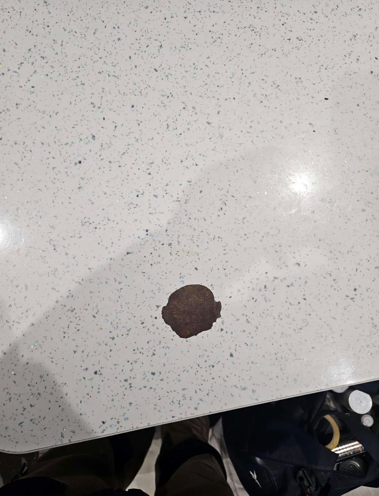 Quartz worktop burn — before repair