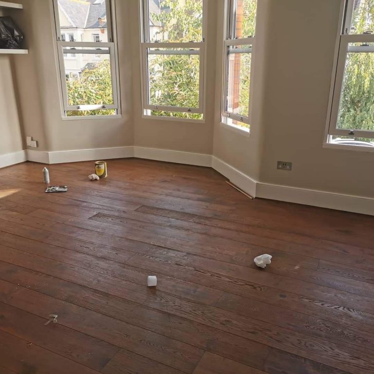 Solid oak floor — before repair
