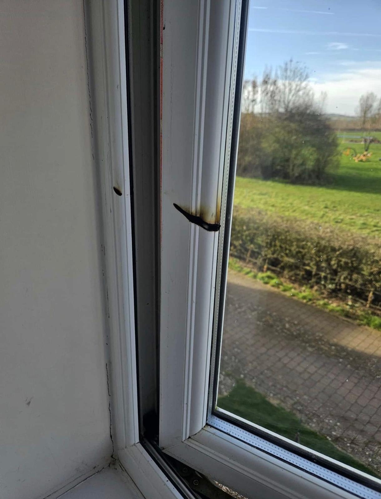 uPVC window frame — before repair